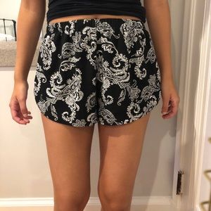 Black printed fabric shorts